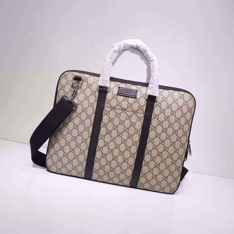 G*u*i top handle bags
